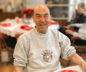 image of smiling resident at holiday brunch