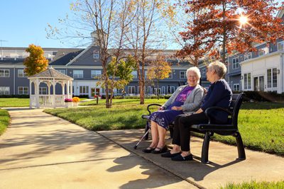 image of Sunnyside Manor residents chatting outdoors