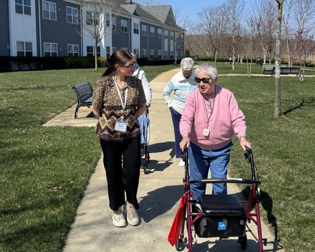 image of resident and caregiver at sunnyside manor senior living in wall nj